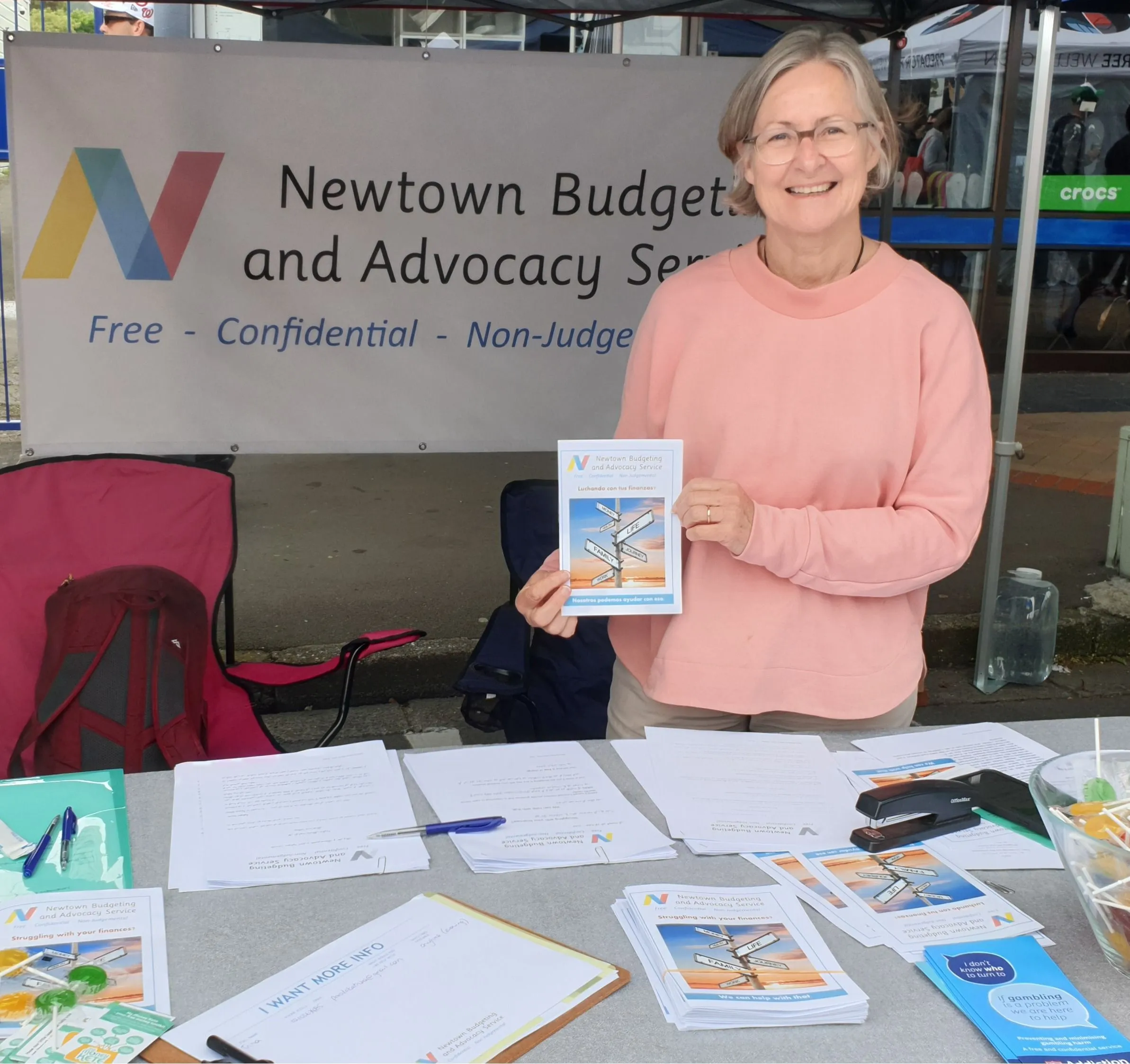 Darien holding a NBAS brochure